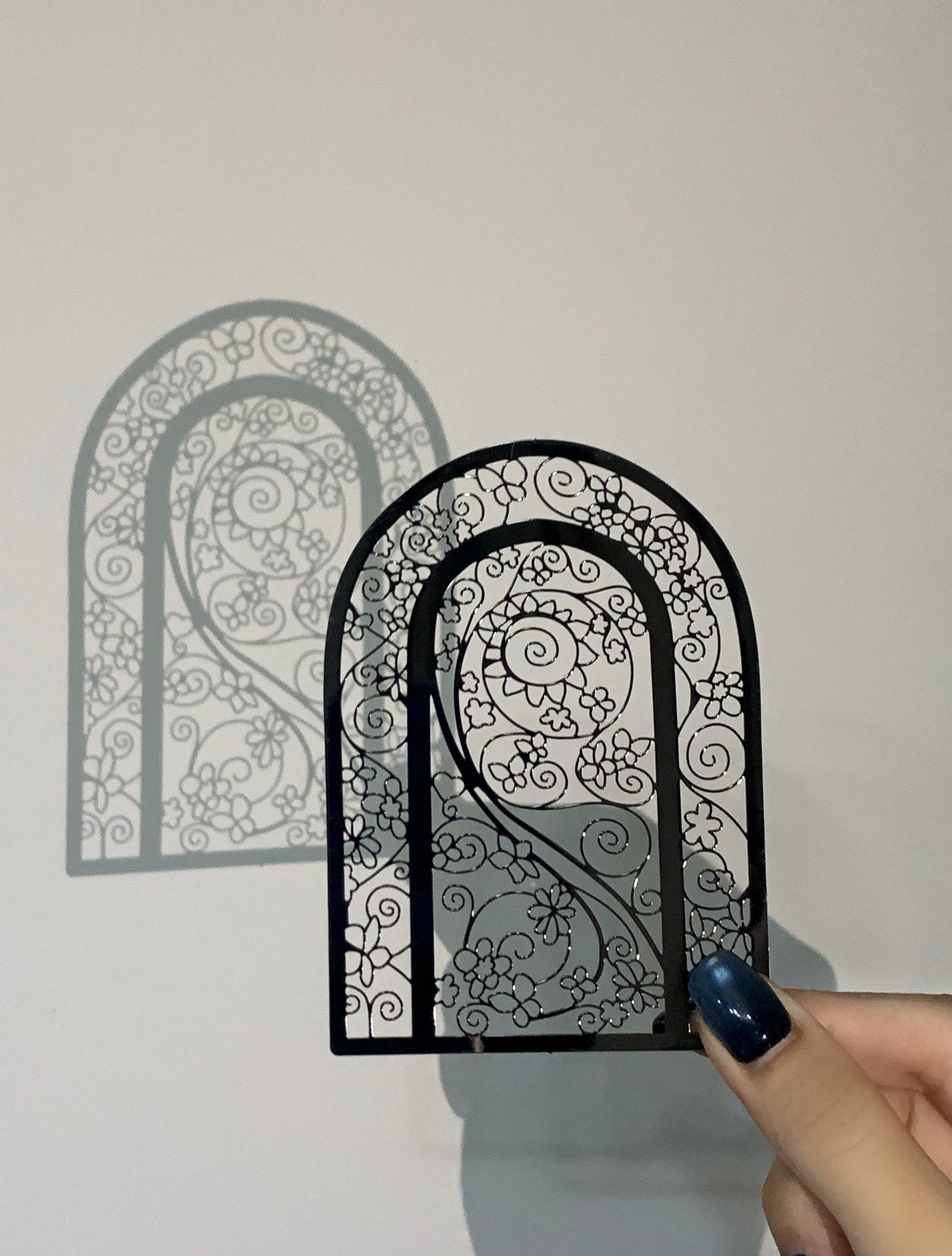 The secret door metal bookmark
