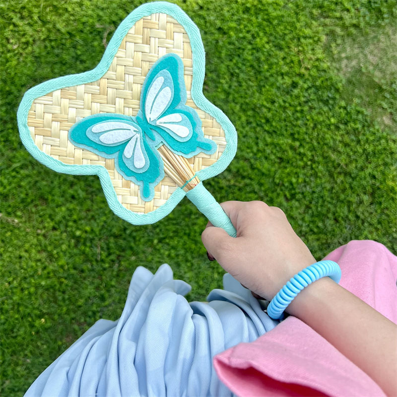 Hand-woven fan in summer